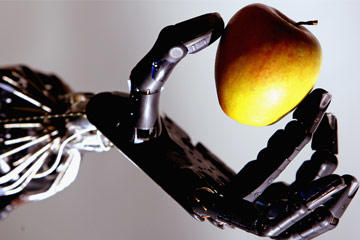 The idea of robots working alongside -- or even in place of -- people isn't exactly new. But today's robots go far beyond the welders and carriers you may have seen on assembly lines. Take the Shadow Robot company's hand robot, for example. It has 40 air muscles and is capable of 24 movements, making it the world's most advanced robot hand. It can even hold an apple without bruising it. What else are today's robots up to?