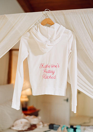Katherine's wedding-day hoodie, which reads "Katherine's Getting Hitched."