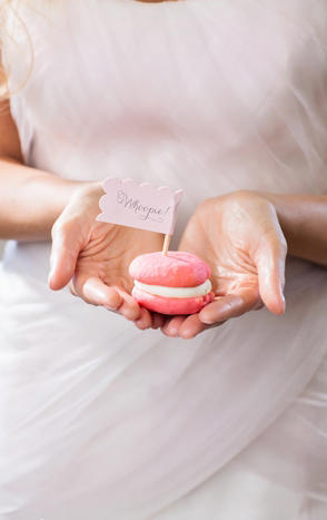 Custom-made pink whoopie pies make sweet wedding favors.