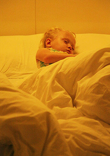 Capsule hotels were created in Japan to provide basic, inexpensive accommodations for individual guests. Josie enjoys some quiet time in the her capsule.