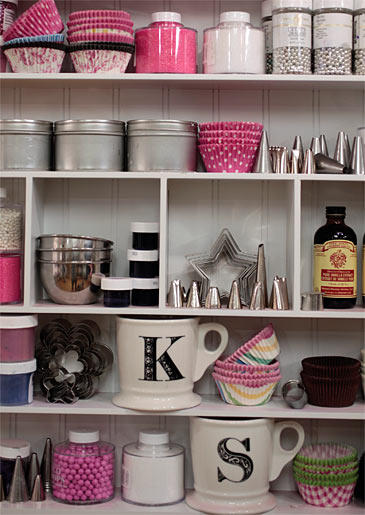 Colorful cupcake liners, decorating tools and sweet ingredients line the shelves at Georgetown Cupcake.