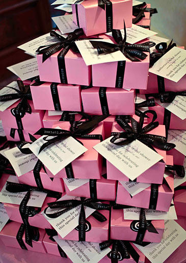 Every guest received as a favor a box of four mini cupcakes in Katherine's favorite flavors: Peanut Butter Fudge, Salted Caramel, Lava Fudge and Vanilla Squared.