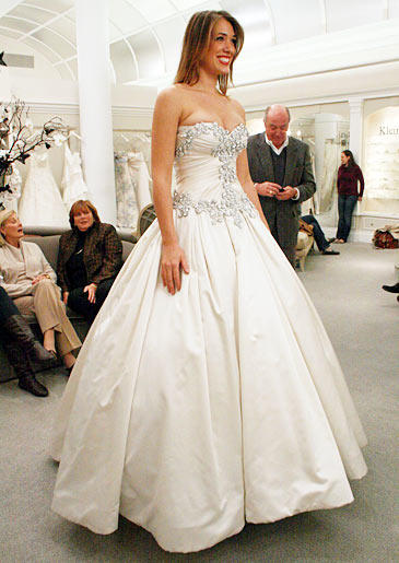 The Rich Daddy's Girl: A dad isn't going to drop 10 grand on a dress for his daughter if he thinks the dress is too sexy or revealing. Saying yes to the dress before dad agrees to pay? That's a risky tactic, but it worked for Liz!