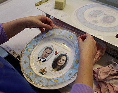 You know you're internationally famous when your face stares back at you from a dinner plate. The royals seem to corner the dinnerware memorabilia market, along with icons like Elvis Presley, or in the case of kiddie tableware, Elmo. Of course, most people don't use commemorative plates for their technical purpose. Instead, dishes featuring the lovely faces of royals are more likely to grace lighted glass cabinets than the dinner table. Here, a worker at Alynsley China in Stoke on Trent, United Kingdom, prepares a collection of plates just after Prince William and Kate Middleton announced their engagement.