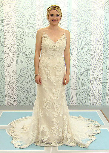 This intricate lace sheath has a plunging V-neck and very thin straps.