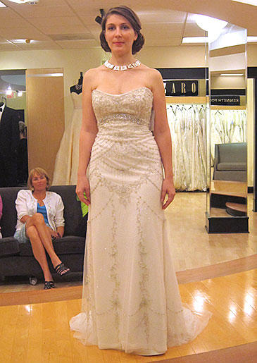 A beaded champagne sheath is perfect for an intimate ceremony or as a reception dress.