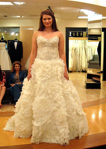 This ball gown is winter wedding-ready with its snowflake-inspired tufted skirt and silver embroidery on the bodice.
