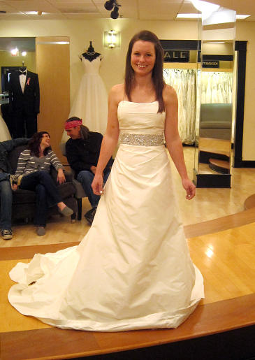 This straight satin neckline has just a hint of ruching; the textural detail gives extra oomph to small-chested brides.