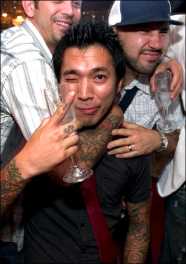 Yoji, Garver and Darren celebrate in their own rough-and-tumble way.