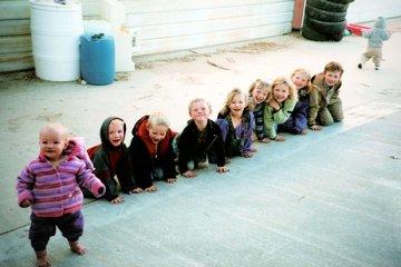 The more, the merrier! The kids line up and strike a pose!