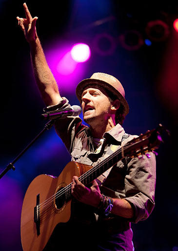 Musician Jason Mraz writes upbeat tunes. He and his friends want Kat to tattoo them with the words, "Be Love," plus a circle and a triangle on his arm.