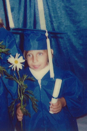 Jen graduating from kindergarten.