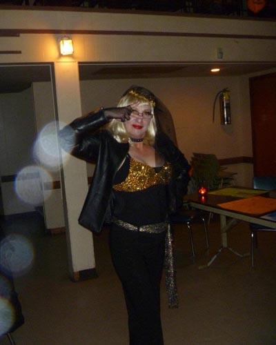 This is me at a Halloween party this past October. Being a huge believer, I was happy to see the visions in this pic! My only sister and sibling passed a few years ago due to MS. My grandmother who was so into psychic abilities and my female soulmate who is in heaven along with other dear family members makes me believe that they are in this photo surrounding me.
-- Janice K.