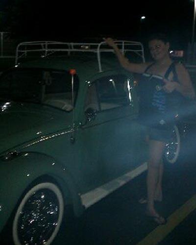 This picture was taken by my sister of me as we were leaving a baseball game. It was random next to this really nice VW beetle in the parking lot. Don’t know what came up but I like to think it’s my guardian angel.
--Kristen N.