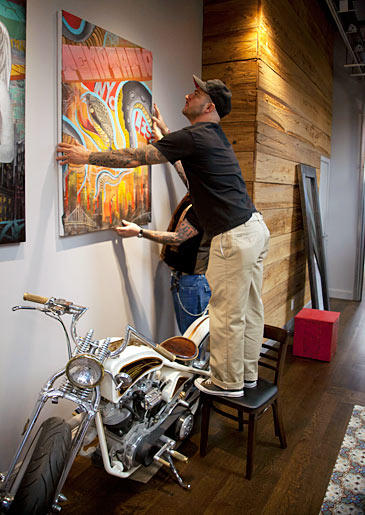 Billy DeCola hanging shop art.