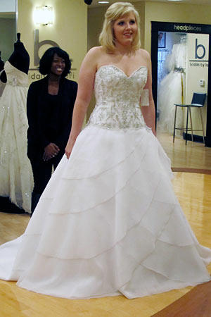 Silver beadwork and bright white organza combine for a winter wonderland effect.