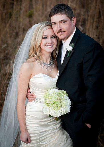 Lindsay and Coty on their wedding day. Photo by