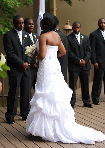 Miranda and her groom exchange vows.