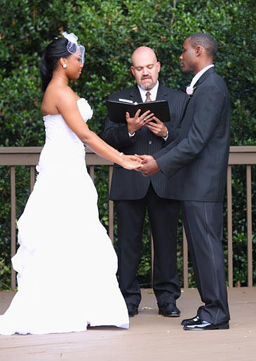 Miranda paired a birdcage veil with her wedding dress for extra drama.