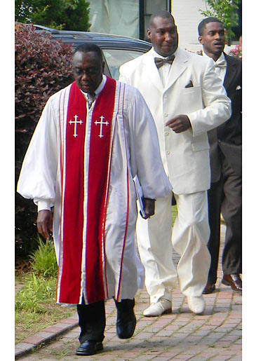 Penny's groom makes his way to the altar.