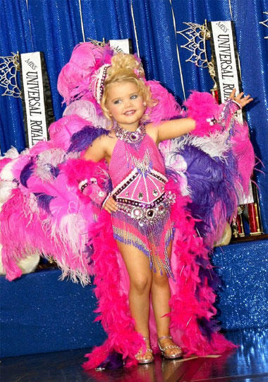 Eden poses on stage.
