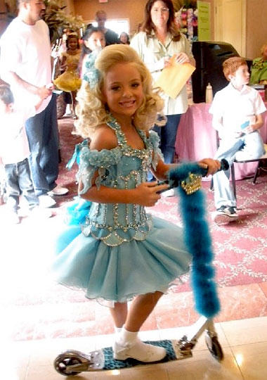 Cassidy waits offstage with her matching scooter.