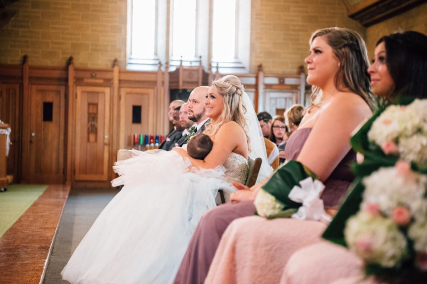 This Photo of a Bride Breastfeeding During her Wedding Ceremony is