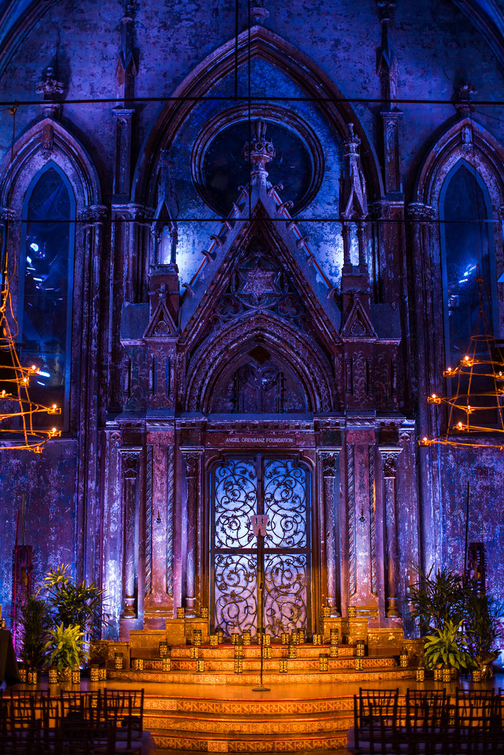One of Andrea's favorite things about the venue was the way the lighting intensified the Gothic decor. The couple chose different lighting elements for every part of the evening.