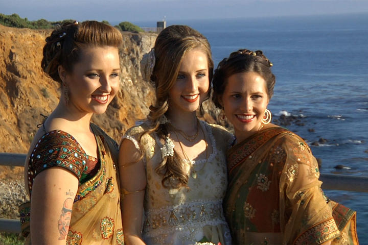 The bride's attendants wore saris instead of bridesmaid dresses.