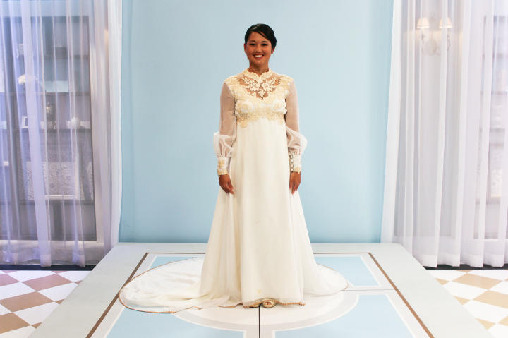 Jaime's mother really wanted her to wear this empire-waisted gown from the 1970s. It had aging lace on the bodice, long sleeves and a high neckline. The dress wasn't Jaime's beachy style at all!