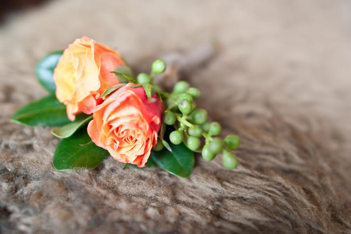 Jeremy's boutonniere also featured fall colors.