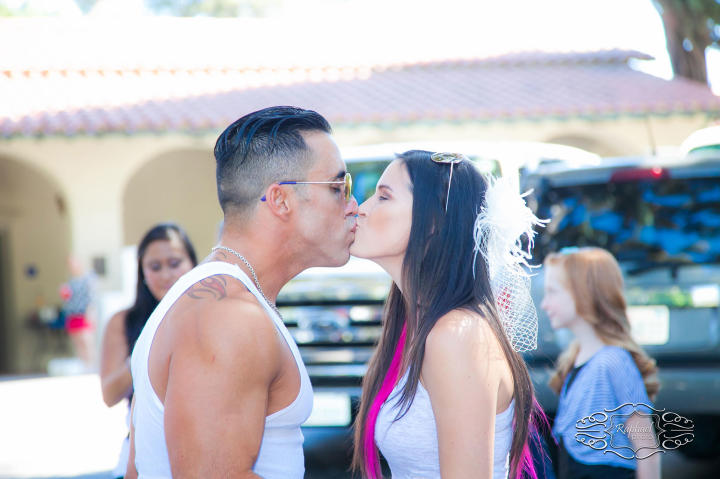 Kelly and Paulie practice their first kiss during rehearsal. It's a gorgeous day for a wedding!