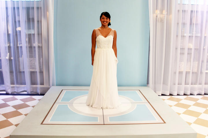 Jaime adored the reworked gown and promised to wear it down the aisle. Kelly gave her a deep V-neck with bead-trimmed illusion straps and a skirt with layers of chiffon for texture and movement. The cost of the makeover was $975.