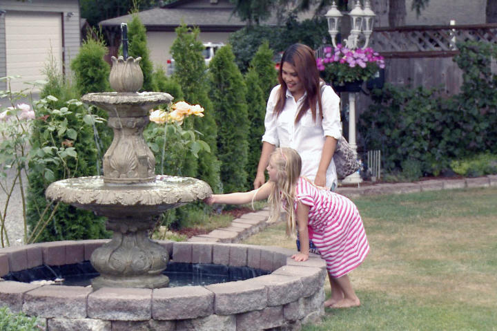 Daya and Cassidy tour the pretty grounds of a prospective wedding venue in Washington.