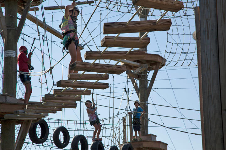Tackling the rope course.
