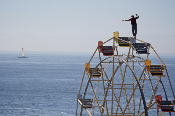 Nik Wallenda practices walking on a Ferris wheel.