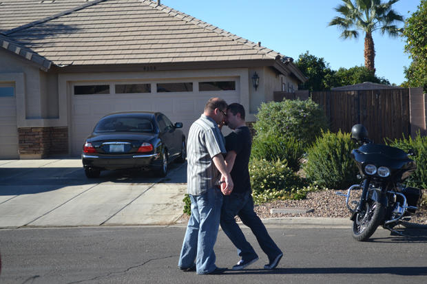 Doug Hopkins and Scott Menaged literally go head to head when bidding for a home.