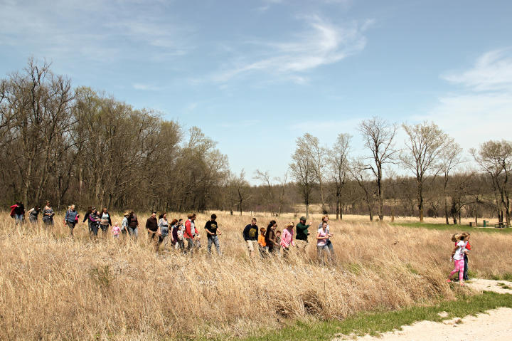 The families explore the Nathan Boone Homestead in Springfield, Missouri.