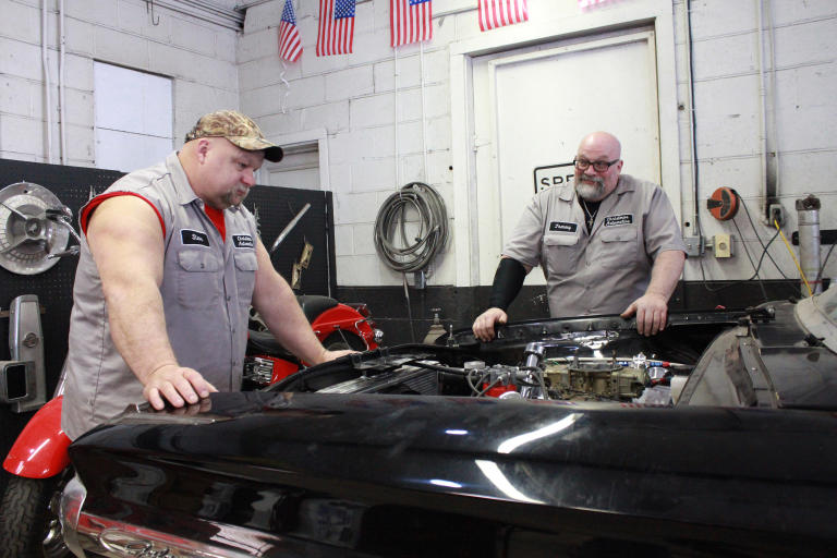 Steve McGranahan and Tommy Christmas looking at the engine area and its possibilities.