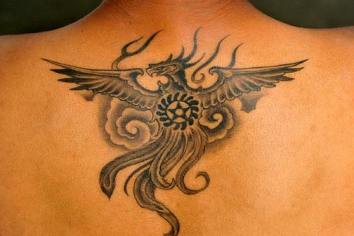 Muata Kamdibe's Tattoo