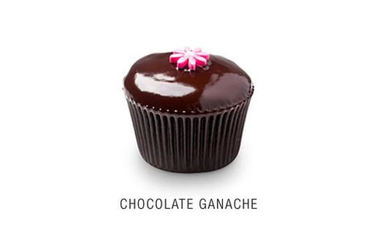 Chocolate Ganache
Valrhona chocolate cupcake with a thin layer of Callebaut chocolate ganache icing topped with a fondant flower.