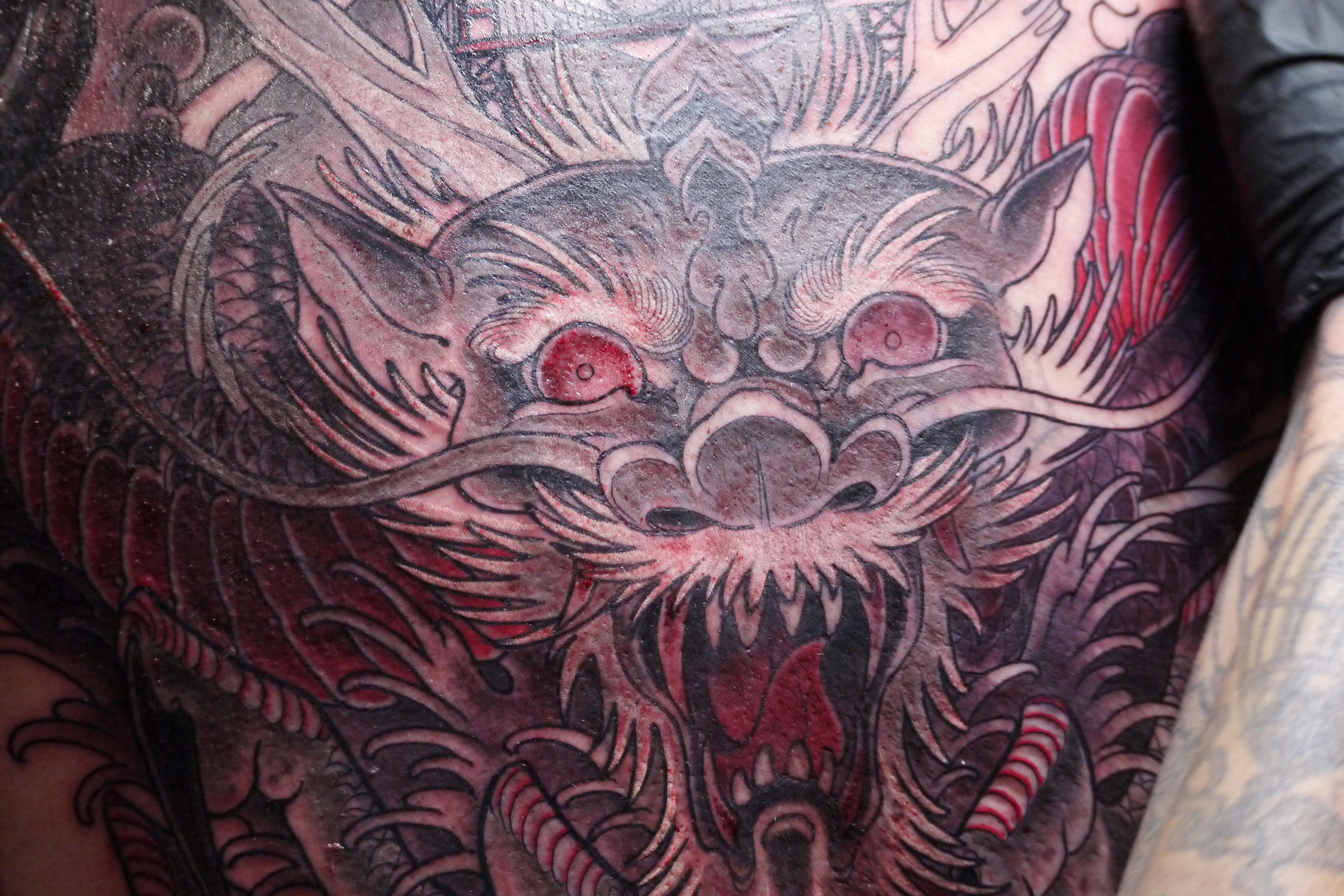 After: Tattoo artist Jeremy Swan gave Mark a massive cover-up on his back to replace his old tattoo.