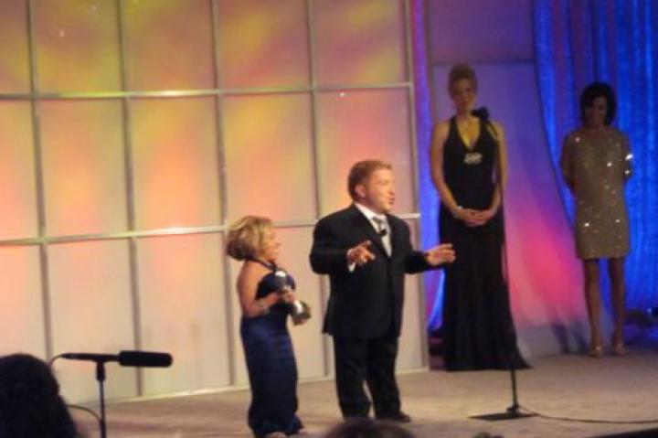 "I'd like to thank all the little people," jokes Bill as he and Jen accept the Gracie Award for The Little Couple.