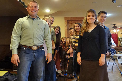 The Bates kids pose according to height and age order.