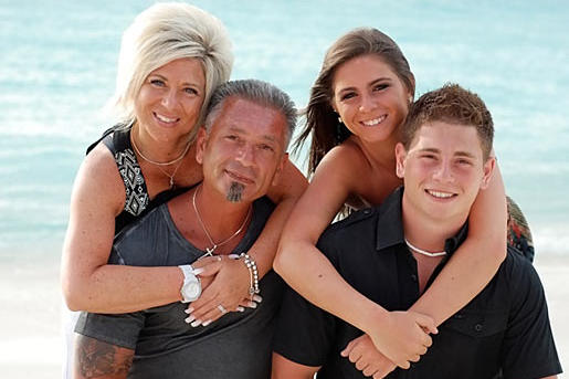 The Caputos on the beach (clockwise from front left: Larry, Teresa, Victoria Lawrence)