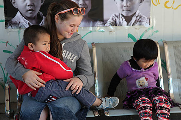 Visiting at an orphanage in China.
