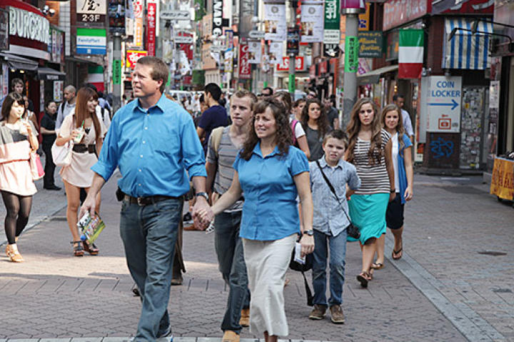Jim Bob and Michelle lead the way through the streets of Tokyo.