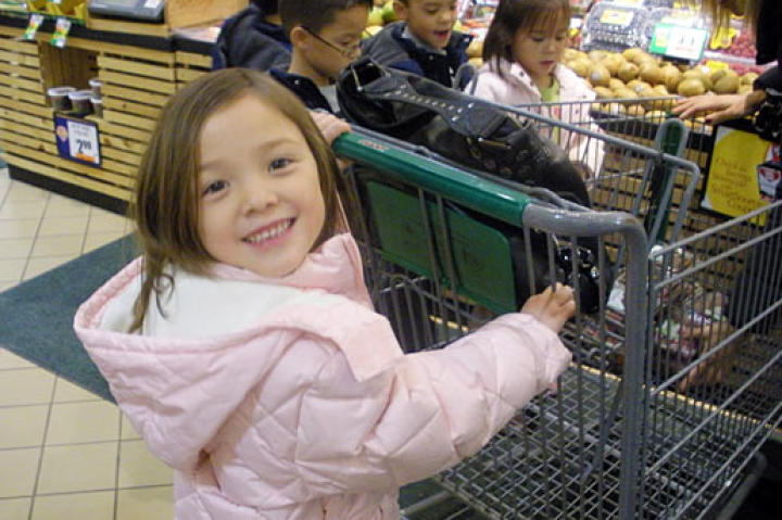 Alexis is excited to drive the cart.