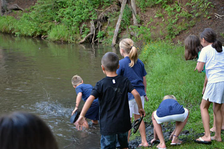 Let the mud fight begin! The Gosselin & Ayers’ kids take advantage of a good “mud hole”.