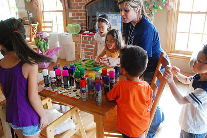 The Gosselin's babysitter, Ashley, instructs the kids on the fun activities of the day.